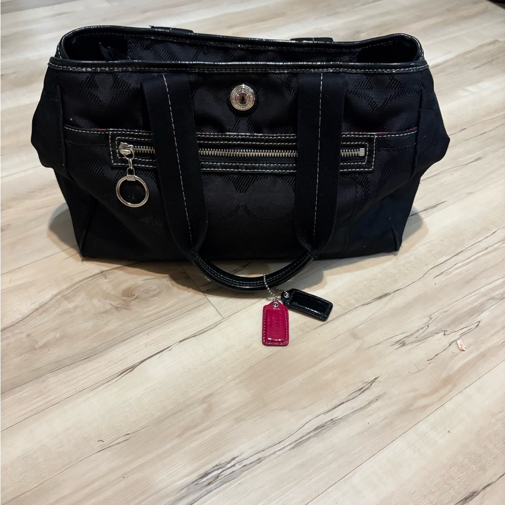 Coach Black Tote Bag with Pink Tag

8” x 14”